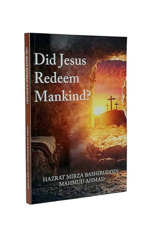 A book titled 'Did Jesus Redeem Mankind?' by Hazrat Mirza Bashiruddin Mahmud Ahmad, standing upright against a light gray background. The cover features a dramatic sunset scene with a cave opening, cross silhouettes, and golden light.