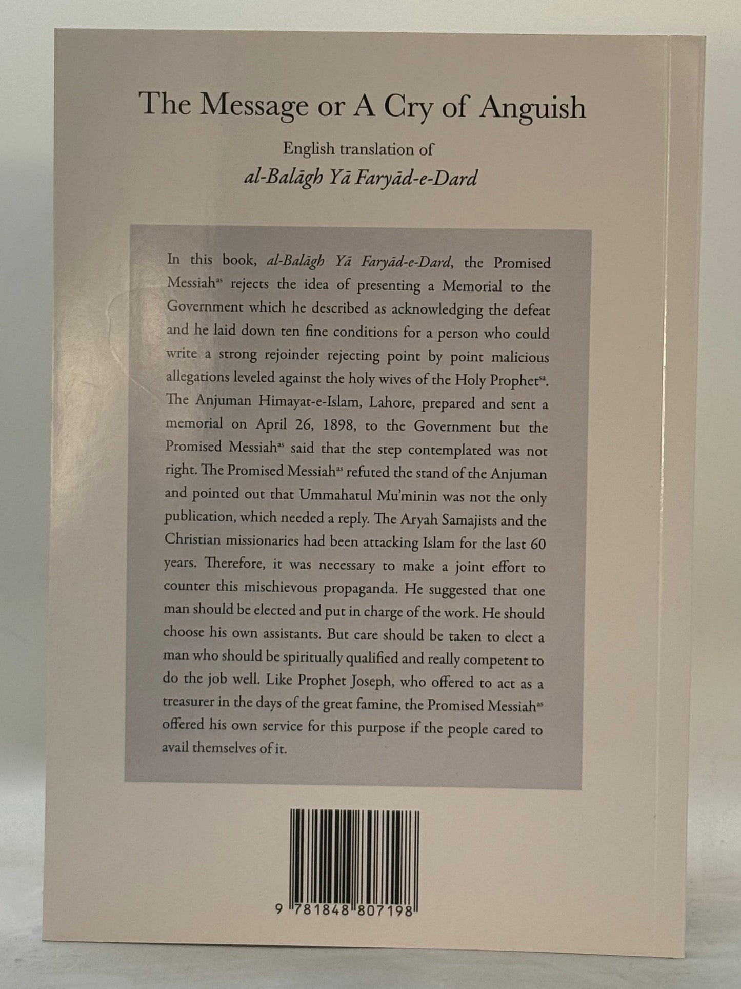 Back cover of a book with text and a barcode on a light gray background