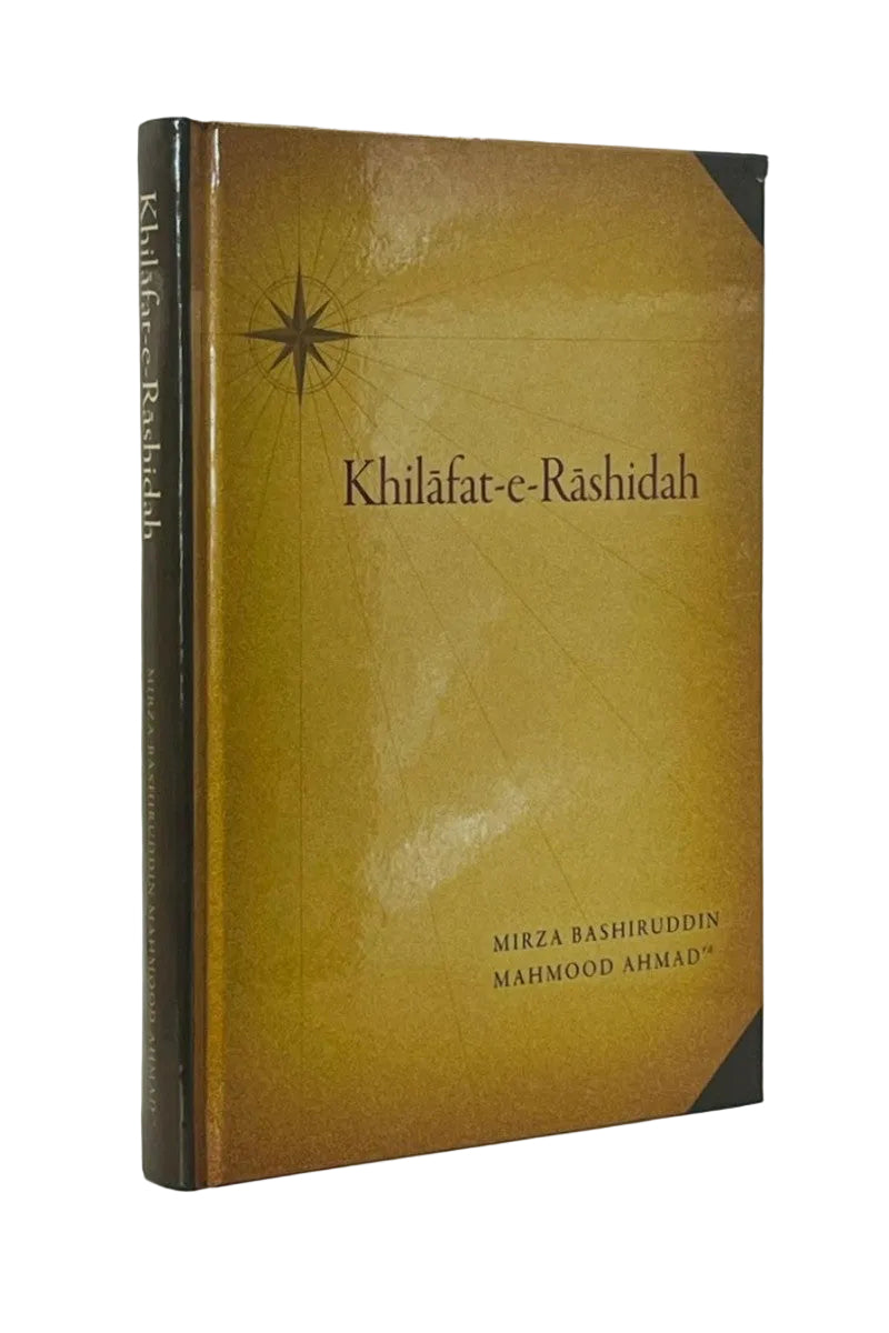 A book titled 'Khilafat-e-Rashidah' by Mirza Bashiruddin and Mahmoud Ahmad, featuring a textured mustard-yellow cover with a black star emblem and dark brown spine, photographed on a light gray background.