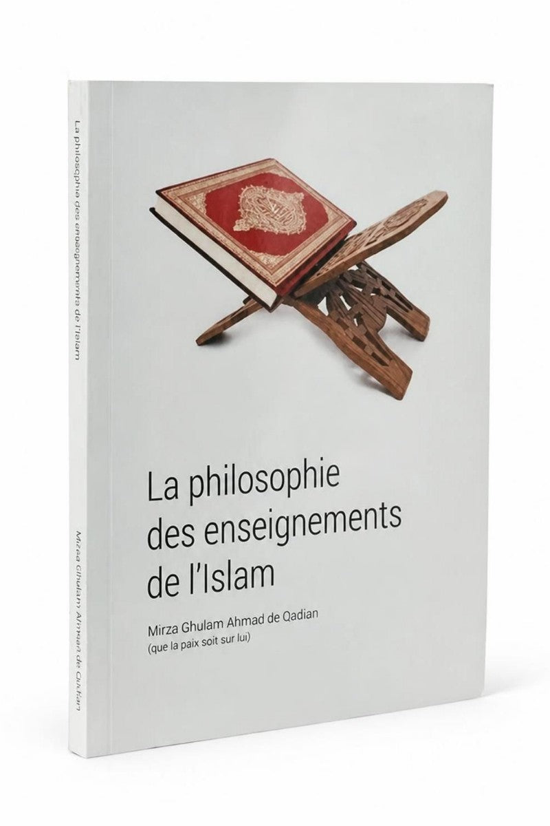 A book titled 'La philosophie des enseignements de l'Islam' by Mirza Ghulam Ahmed de Qodtan, featuring a white cover with a photo of a red Quran on a wooden stand.