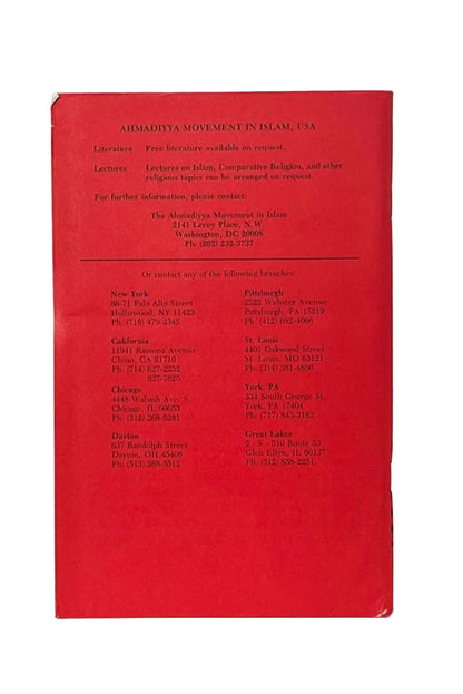 A red book or pamphlet cover photographed against a white background, with black printed text reading 'AHMADYIA MOVEMENT IN ISLAM, USA' and contact/location information for branches in New York, California, Chicago, Detroit, Pittsburgh, St. Louis, and Grand Rapids.