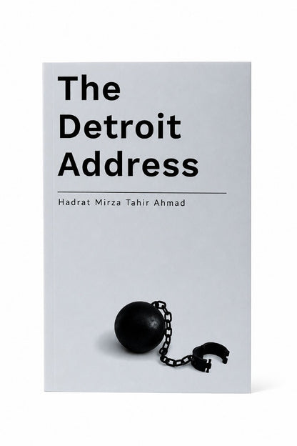 Book titled 'The Detroit Address' with a ball and chain on a light gray background