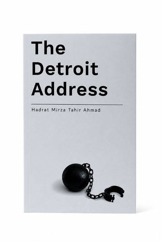 Book titled 'The Detroit Address' with a ball and chain on a light gray background
